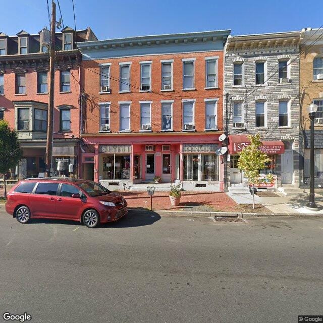 209 211 W King