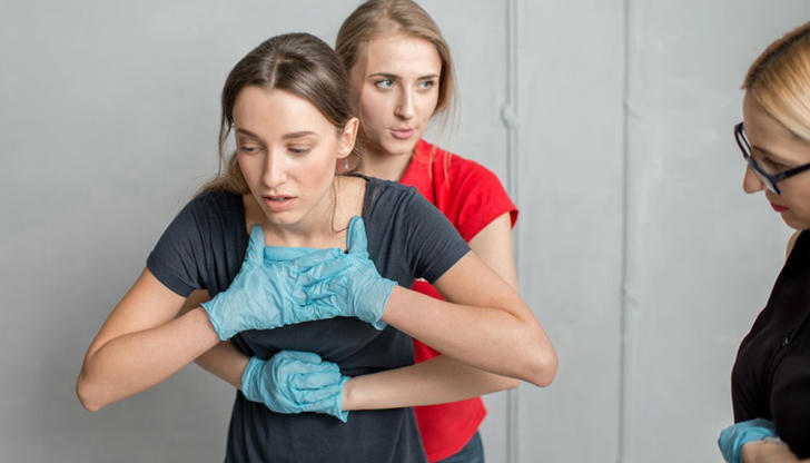 Which action is commonly recommended to clear an airway during choking emergencies?