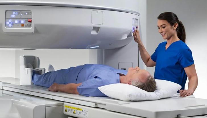 Which scan uses powerful magnets rather than radiation to create detailed body images?