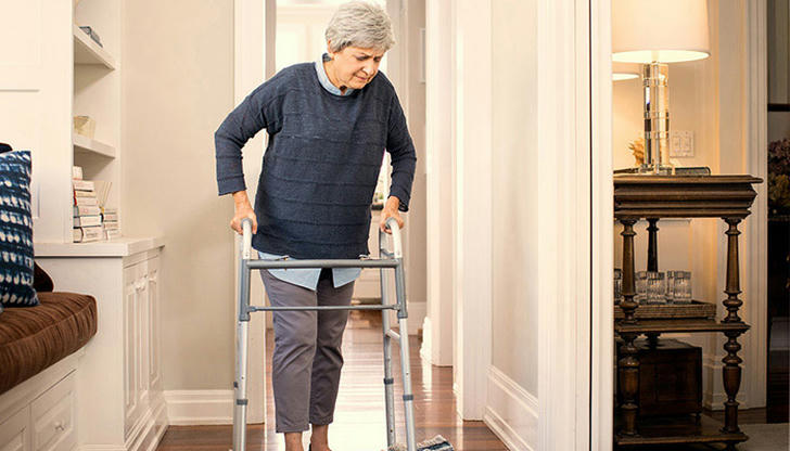 Which action helps reduce fall risk for older patients?