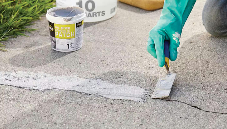 What is the most common method used to repair small cracks in concrete?