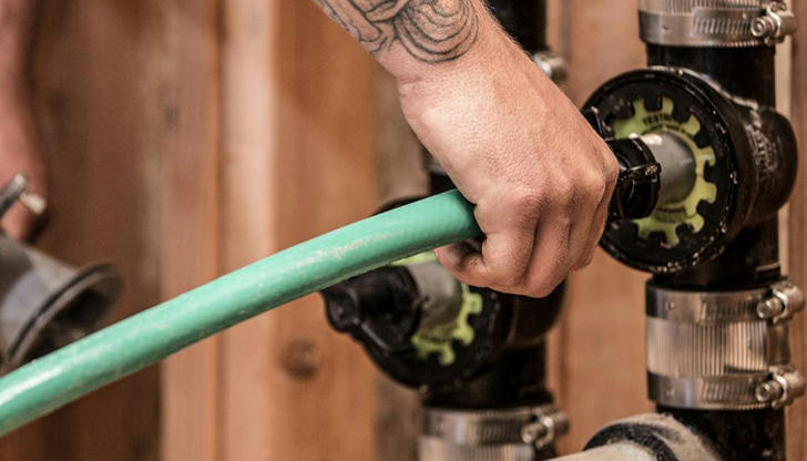 What is the function of a test plug in plumbing?
