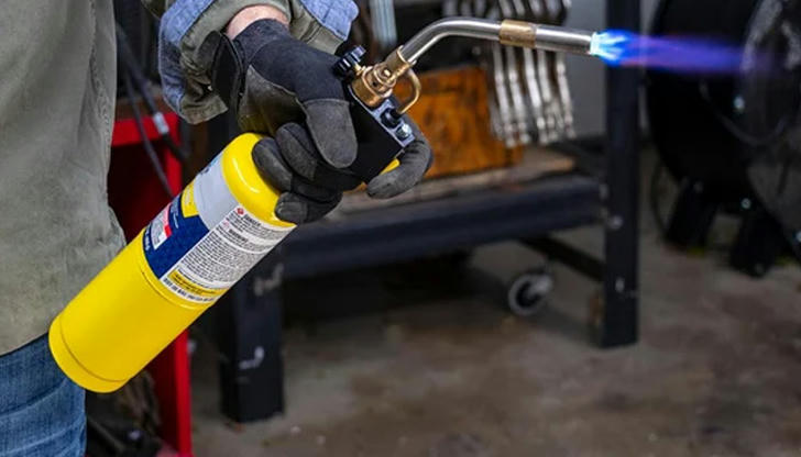 What safety rule applies when using a propane torch?
