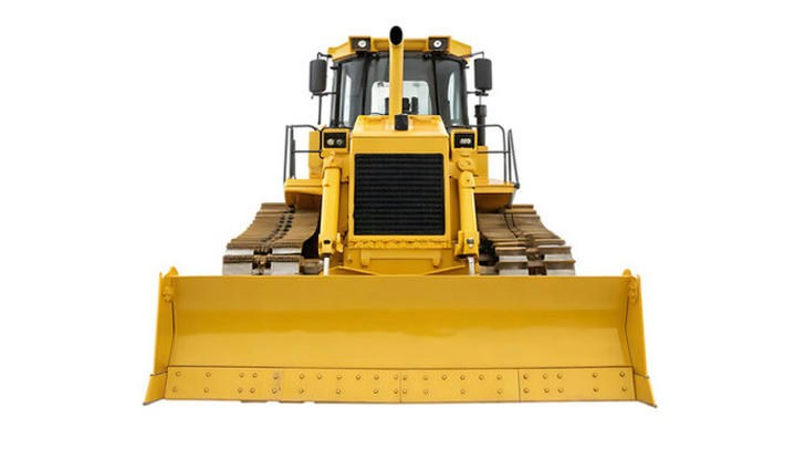 Which machine moves large amounts of dirt to level surfaces?