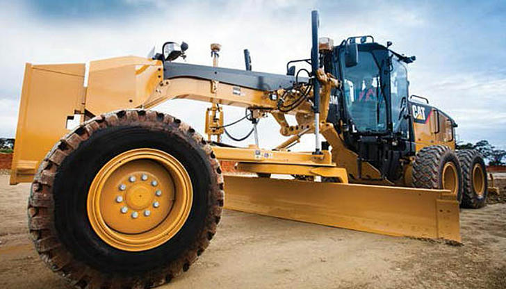What is this machine primarily used to level and smooth roads?