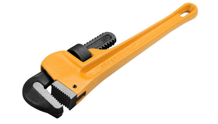 Which tool is used to tighten or loosen threaded pipes during installation?