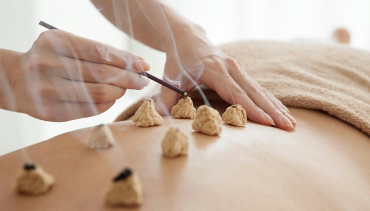 This therapy uses a heated herbal stick. Which one?