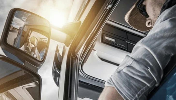 Which mirror check is most important before changing lanes?