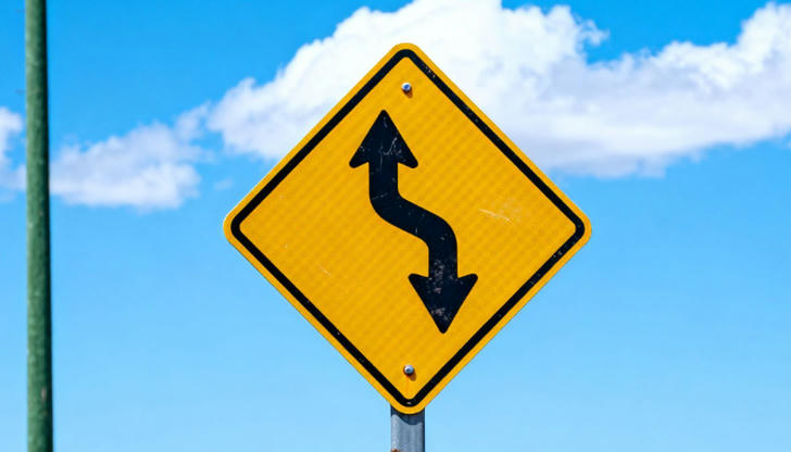 Which color reflects a warning sign?