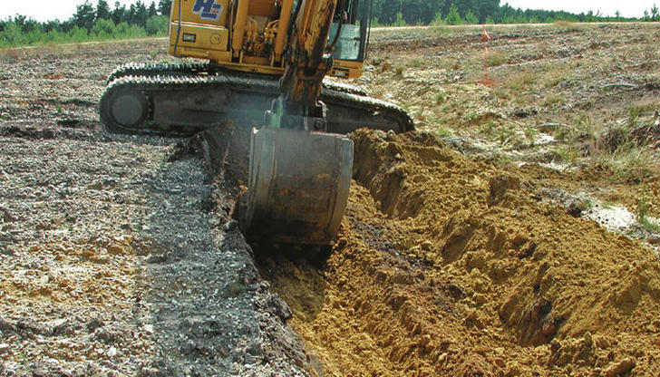 The long hydraulic arm on an excavator allows the operator to: