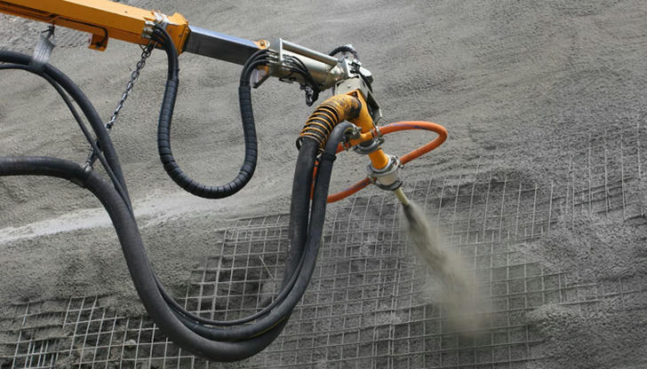 Which equipment helps spray concrete onto surfaces at high speed?