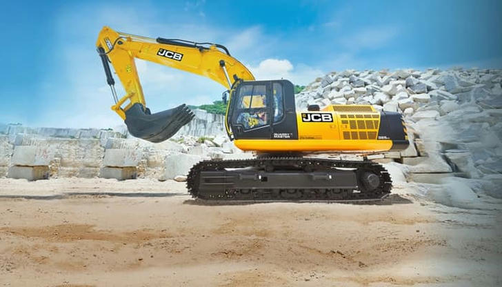 Which excavator has tracks and digs on rough ground?