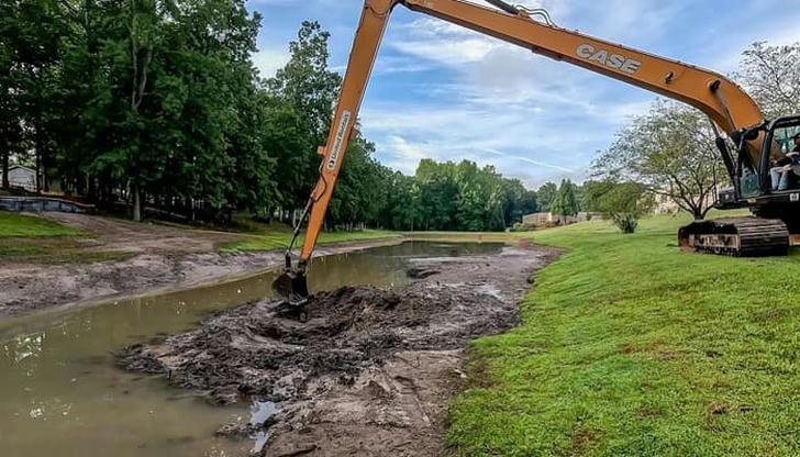 What is the main use of a long-reach excavator?