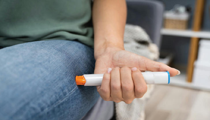 What is the first-choice medication given in hospitals for anaphylactic reactions?