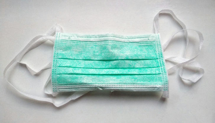 Which disposable item covers the nose and mouth to reduce the spread of germs?