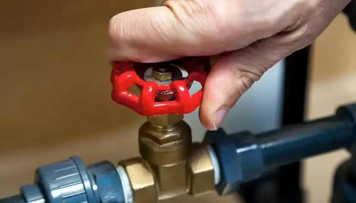 A pipe bursts and water spreads fast. What should you do first?