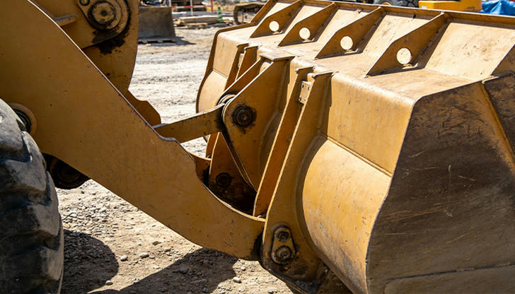 Which part allows a wheel loader to turn in tight spaces?