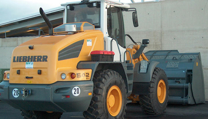 Which area is hardest to see when driving a wheel loader?