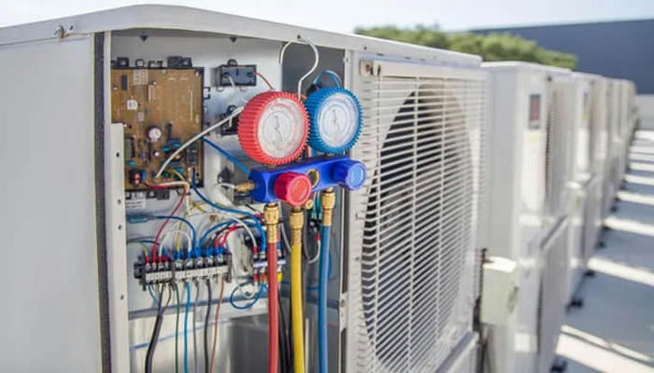 The refrigerant cycle in an air conditioner mainly involves: