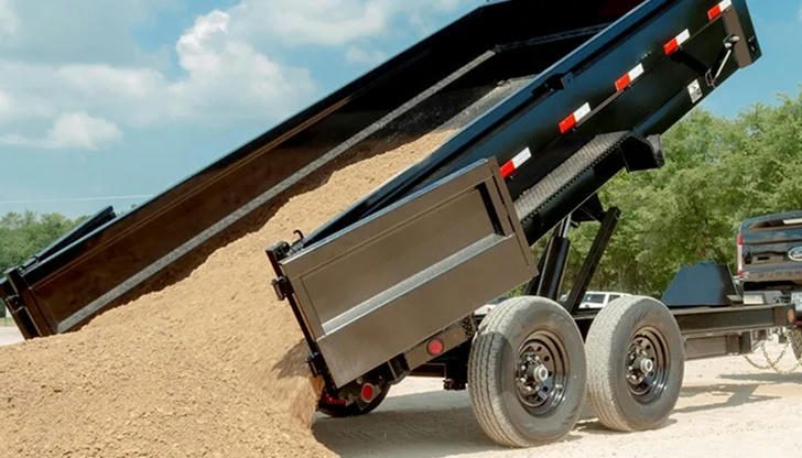 Which part lifts the dump bed to unload?