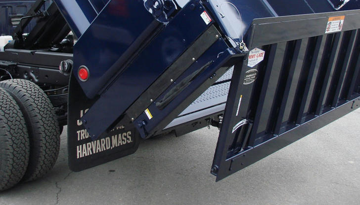 Which part opens at the back to release the load?