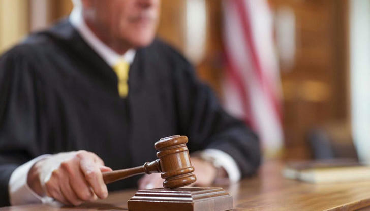 Which term describes a court order that requires a party to do or refrain from doing specific acts?