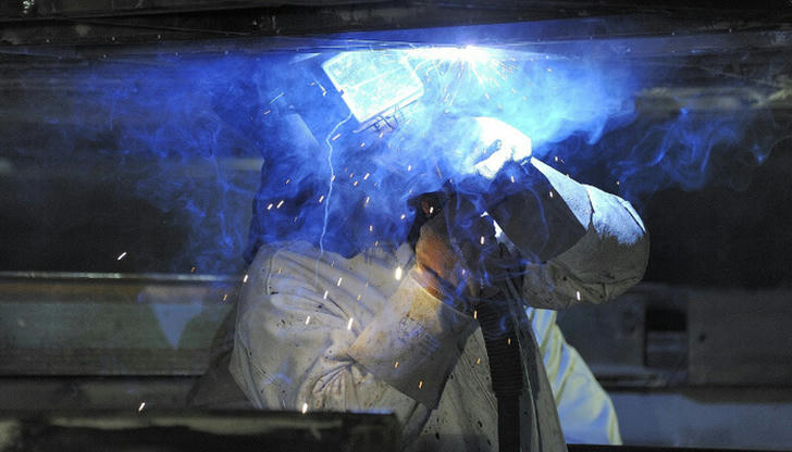 Welding inside a closed garage without ventilation mainly increases the risk of what?