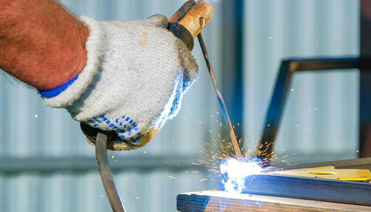 What does the electrode holder do in stick welding?