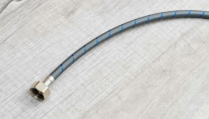 Which material is commonly used for modern flexible water lines?