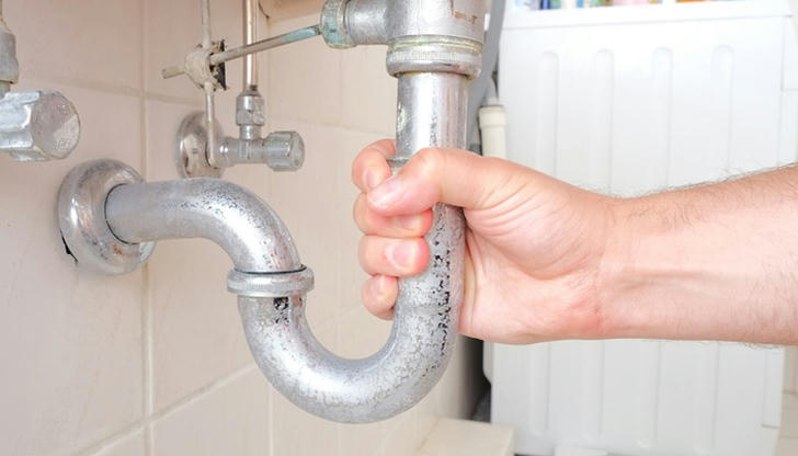 Which part helps stop sewer gas from coming back up?