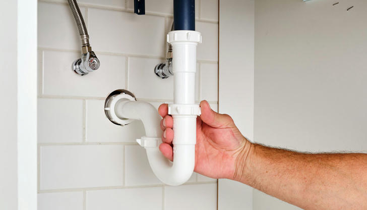 You need to prevent backflow in a sink drain. Which part is correct?