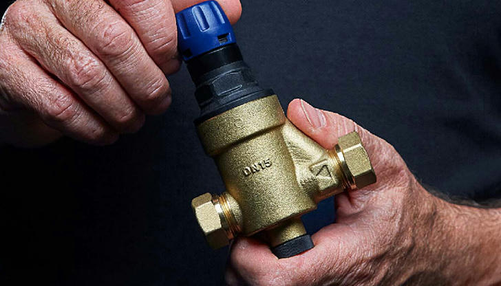 Which valve automatically prevents reverse water flow?
