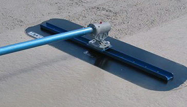 Which step in concrete work commonly requires the use of a bull float?