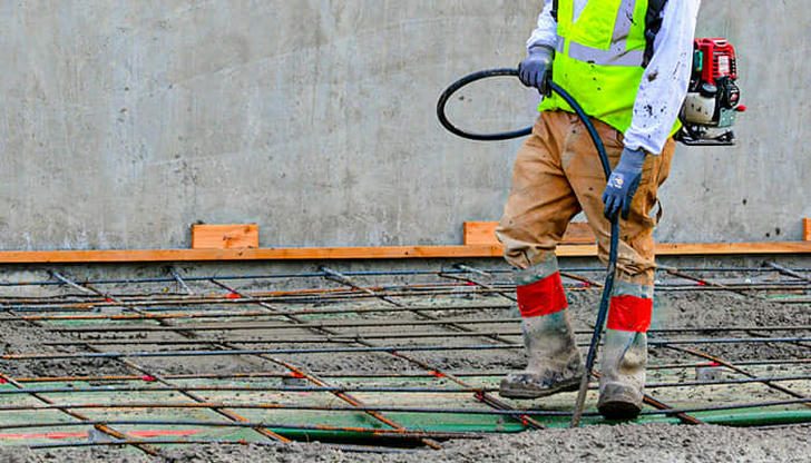 When would a concrete vibrator typically be used?