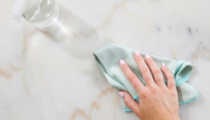 Which cleaner should NOT be used on marble countertops?