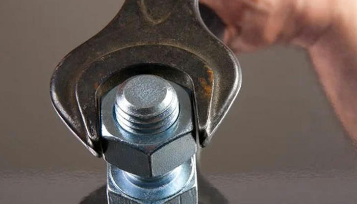A leaking compression fitting is usually fixed by: