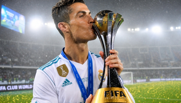 Under the expanded 2026 design, how many total matches must the champion play to lift the cup?