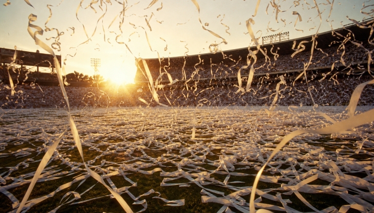 In what year did Argentina host and win their first-ever World Cup trophy amidst cloud-like ticker tape?