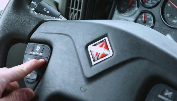 7. What control do you use to adjust the cruise control speed in a truck?