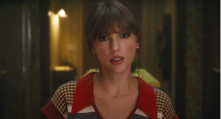 What was Taylor Swift's first song to chart on the Billboard Top 100?